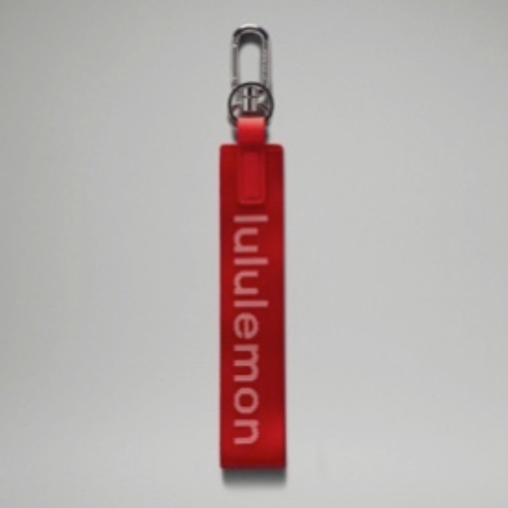 Lulu Red Lululemon Never Lost Keychain! Perfect condition! Red never lost - Picture 5 of 5